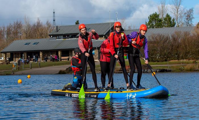 Groups of people can take to the water as a team on our tiki boards.